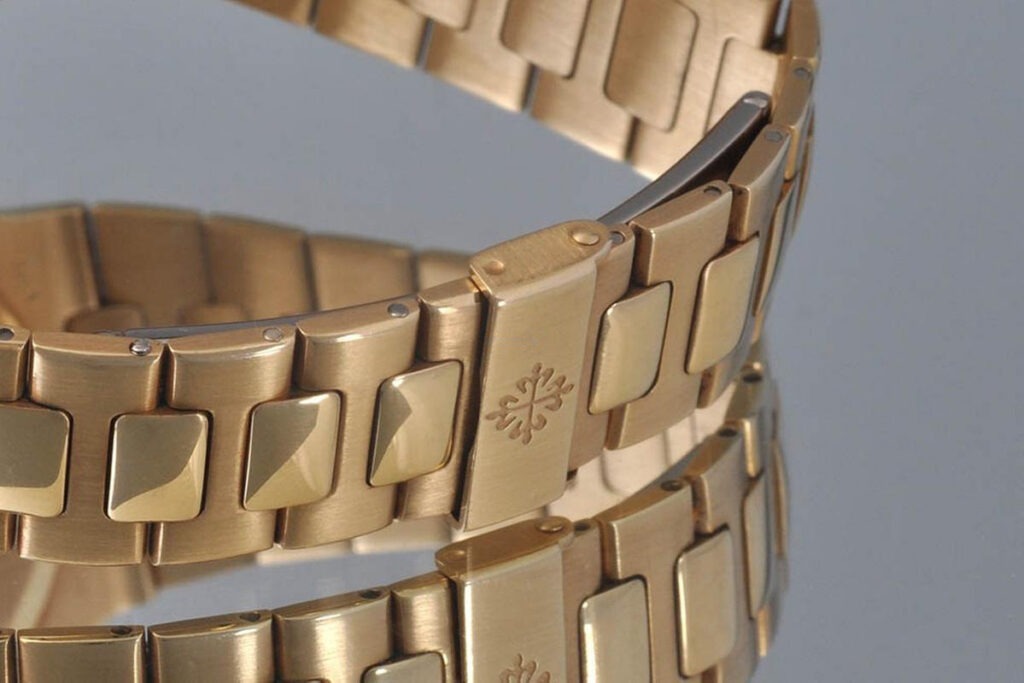 Patek Philippe Nautilus 3800 37MM White Dial With 18K Yellow Gold Bracelet
