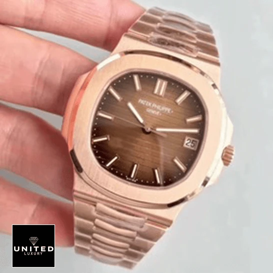 Patek Philippe Nautilus 5711/1R-001 Replica 4 Patek Philippe Nautilus Rose Gold Dial Replica on the hand